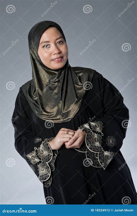 Mature Muslim Woman Suffering From Headache Sitting At Home Panorama Stock Photo