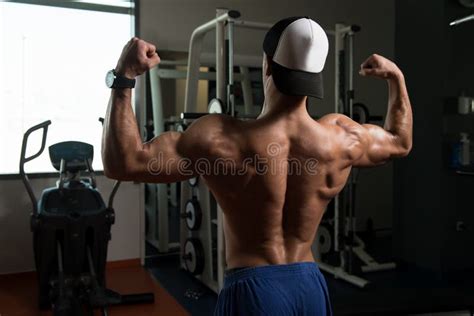 Muscular Man Flexing Muscles In Gym Stock Image Image Of Model