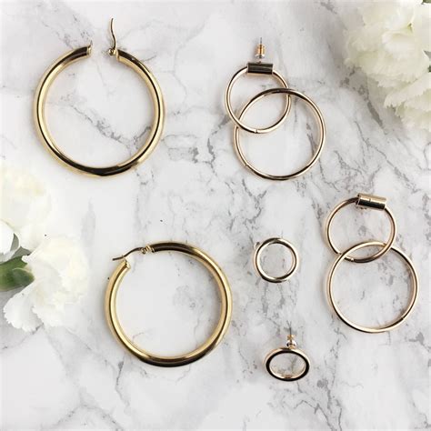 3 Ways To Wear The Gold Hoop Earring Trend In 2018 Le Fab Chic