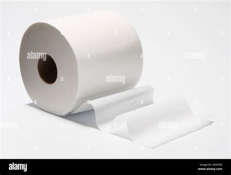 A Slightly Unrolled Roll Of White Bathroom Tissue Toilet Paper Stock