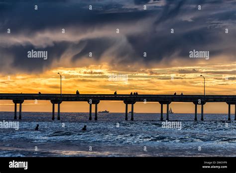 Ocean Beach Pier And Clouds With A Vibrant Sunset San Diego