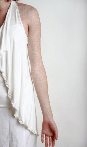 Due to the fact that they are white, they also really go with everything, including your wedding dress! White paisley lace tattoos (HJW via RK) | The Noble Armadillo