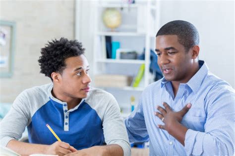 180 Serious Father Talking To Teenage Son At Home Stock Photos