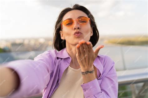 Free Photo Cute Short Haired Woman In Orange Sunglasses Making Self