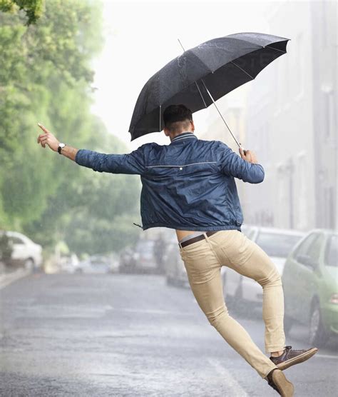 Man Dancing With Umbrella In Rainy Street Caif19754 Sam Edwards