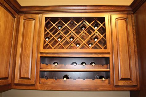 Wine racks for kitchen cabinets install inside a cabinet or below the upper cabinets. Wine Rack - Lattice Rack Over Scalloped Rack - Burrows Cabinets - central Texas builder-direct ...