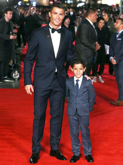 Cristiano ronaldo dos santos aveiro. Cristiano Ronaldo Brings His Look-Alike Son to Red Carpet ...