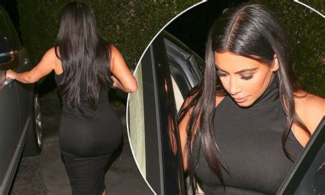 Kim Kardashian Shows Off Her Famous Derriere In Black Bodycon Dress