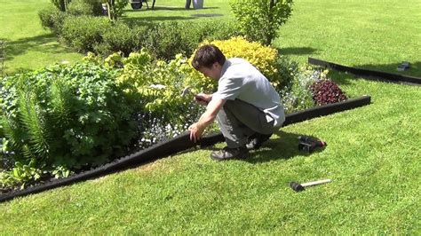 The main purpose of edging your lawn is to create borders or to separate different functional spaces within your lawn. How to Install Crumb Rubber Garden Edging - YouTube