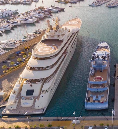 billionaire vs millionaire 🛥 the yacht on the left is mega yacht ‘dilbar luxury yachts