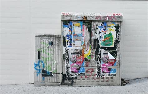 Silver Garbage Containers With Graffiti And Posted Posters · Free Stock