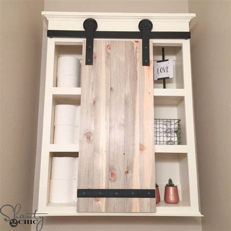 Those who entertain openly and don't stress about their houses and those who tend to fret over the little details. DIY Sliding Barn Door Bathroom Cabinet - Shanty 2 Chic