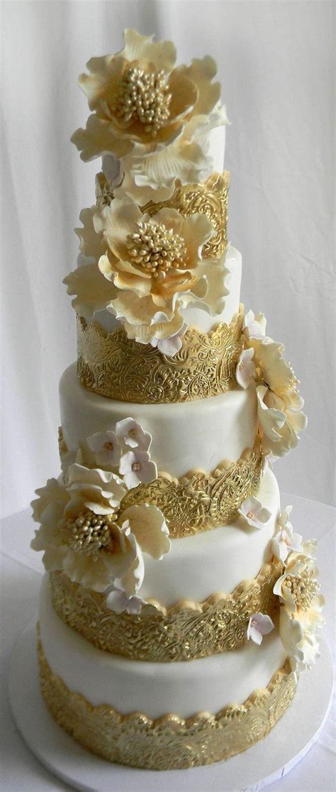 In some parts of england, the wedding cake is served at a wedding breakfast; Gold Wedding - White & Gold Wedding Cakes #2211564 - Weddbook