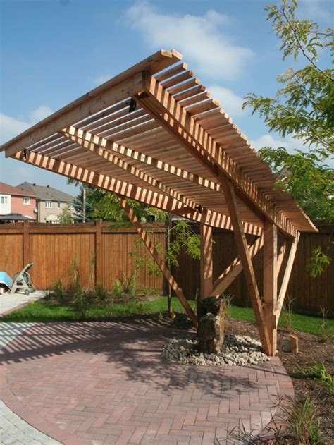 A modern sunroof pergola is a simple extension that gives additional shade to your home and keeps it cool on hot summer days. Cantilever Pergola | Houzz