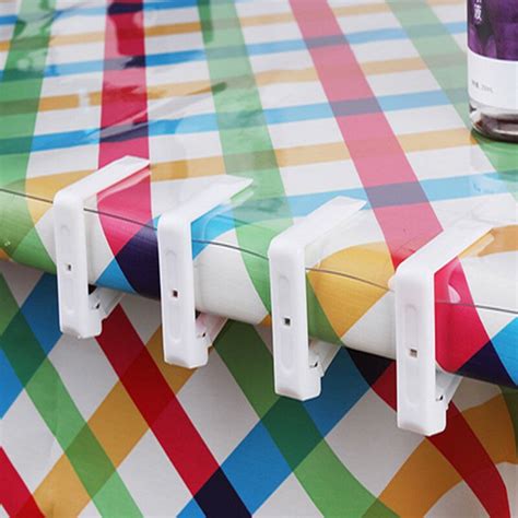 It was this yellowish co. 4 PCS Plastic Table Cover Cloth Stainless Steel Tablecloth Clip Clamp Holder Wedding-in Party ...