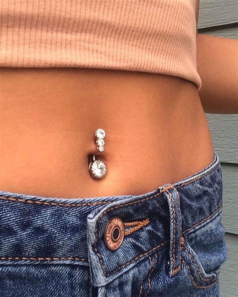 Picture Of A Multi Gem Belly Button Piercing Is A Bold And Shiny Idea For A Modern And Bold Look