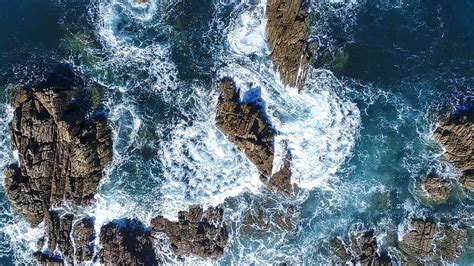 Hd Wallpaper Ocean Waves Hammering Stone Formation Aerial Photography Of Ocean Wave Crashing