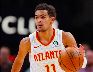Point guard for the atlanta hawks throughthelens.com. Trae Young Helps Pay Off More Than $1M Worth Of Medical ...