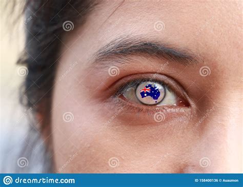 Human Face With Australian Map Outline With Flag Color On The Center Of