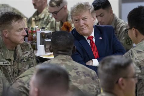 Photos Trump Makes Surprise Thanksgiving Visit To Troops In Afghanistan