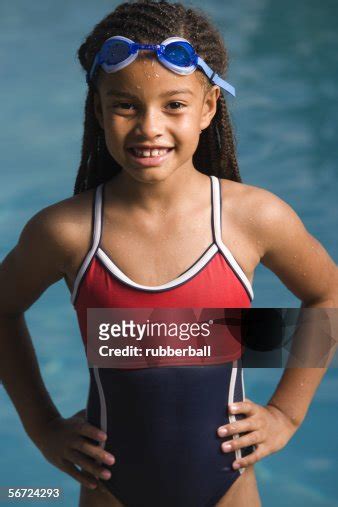Portrait Of A Girl Standing At A Swimming Pool And Smiling Bildbanksbilder Getty Images