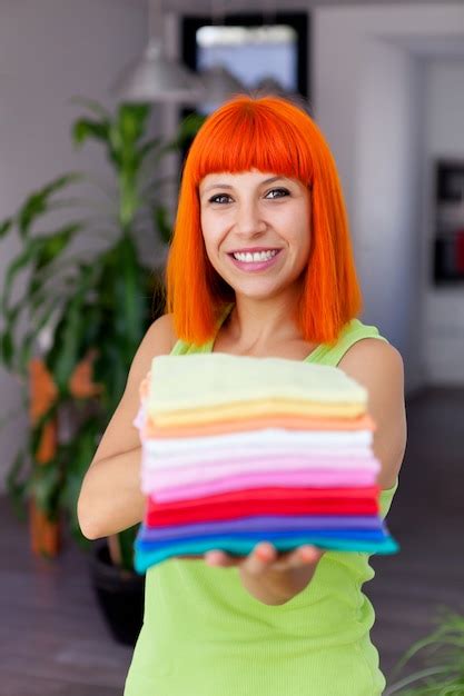 Premium Photo Redhead Woman Doing Laundry