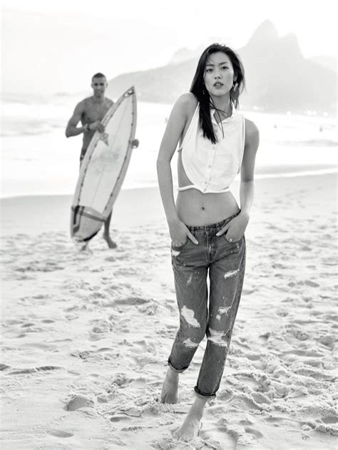 Liu Wen Hits The Beach In Cropped Shirt And Distressed Denim Beach
