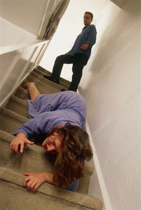 Woman Being Pushed Downstairs By Her Partner Stock Image M Science Photo Library