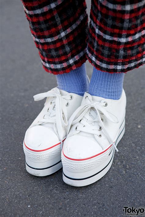 oversized top connecter clutch and platform sneakers in harajuku tokyo fashion