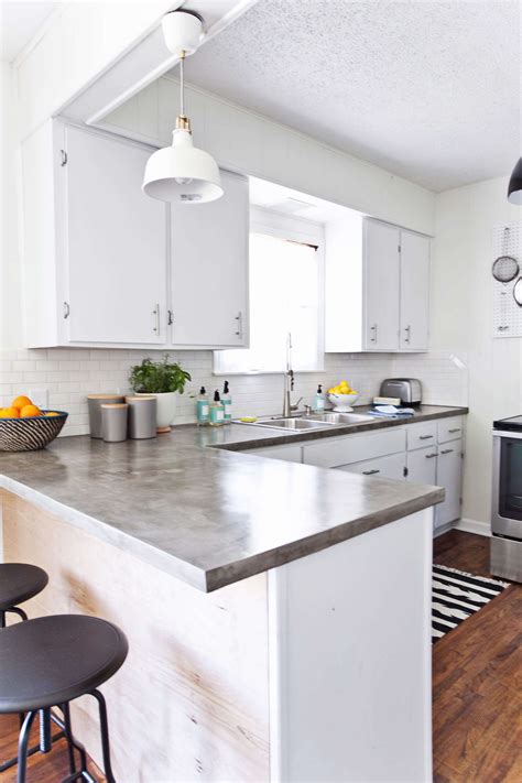 35+ Ideas about White Kitchen Cabinets at TheyDesign ... White cabinets provide a strong focal point for your kitchen design, but the color you select for your countertop will also affect your the matching floor would consist of alternating black and white tiles in the classic checkerboard pattern, with glossy white ceramic tiles for your countertop's backsplash.