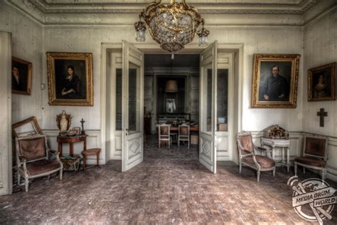 Haunting Images Reveal An Abandoned Manor Filled With Ghostly Portrait
