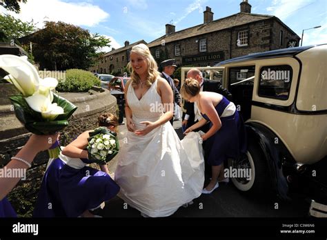 A Bride Arrives At The Church To Get Married Stock Photo Alamy