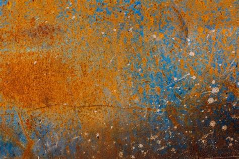 Rusty Metal Surface Covered With Cracked Paint Premium Photo