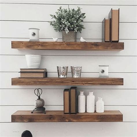 A floating shelves with a design like this can work as a great focal point and beautify the walls in your living room. 35 Stunning Floating Shelves For Living Room Decor Ideas - belihouse.com | Floating shelves ...