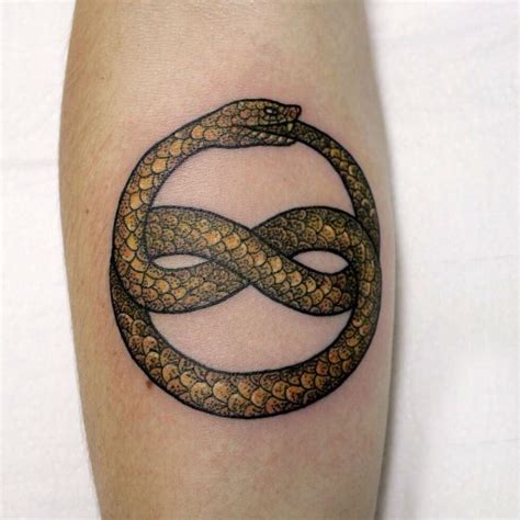 Ouroboros, an ancient symbol depicting a serpent or dragon eating its own tail; 60+ Mythical Ouroboros Tattoo Ideas - What Goes Around ...