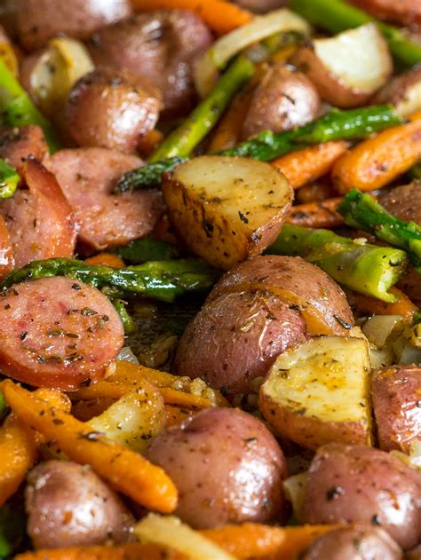It's ideal for winter evenings and it takes less than an hour to cook. Kielbasa Veggie Sheet Pan Dinner - 12 Tomatoes