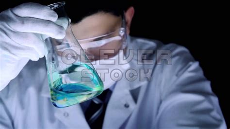 Scientist Mixing Chemicals Beaker Chemist Observation Experiment