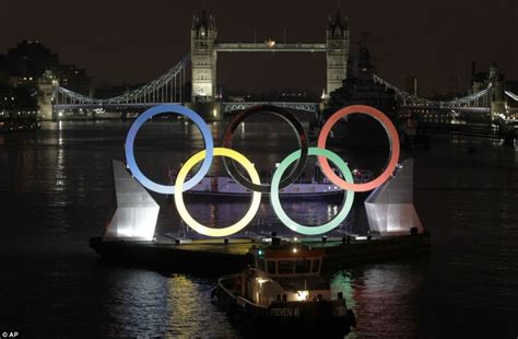 Maybe you would like to learn more about one of these? Ringing in the games! Huge Olympic logo floats down the ...