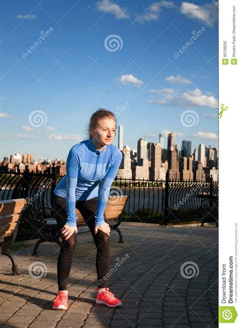 Tired Woman Runner Taking A Rest After Running Hard Stock Photo Image