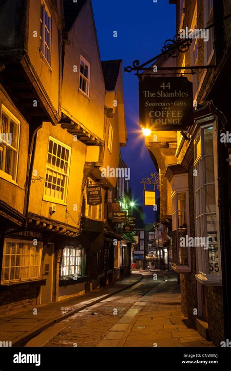 Colourful Night Shot Of The Shambles Showing Over Hanging Buildings