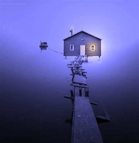 Royalty Free Photo Brown Wooden House With Wooden Dock Under Purple