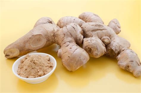 Root Ginger And Ground Spice Free Stock Image