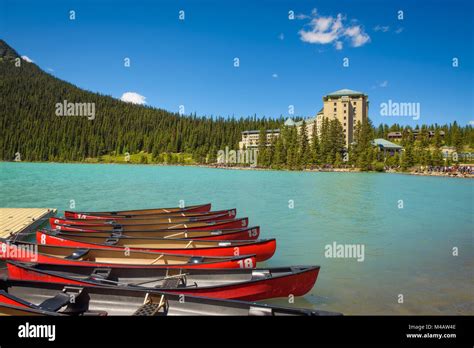 Canoes On A Jetty At Lake Louise In Banff National Park Canada Stock