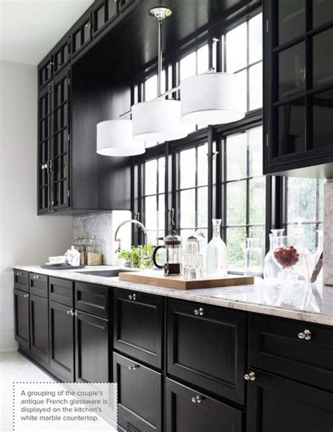 White cabinets match the natural and timeless look of the gray stone slab backsplash and gray soapstone kitchen countertop. The Peak of Très Chic: Needing, Wanting, Loving: A Black ...