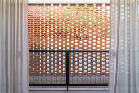 Casa Grid Features Brick Screens Set Into Concrete Frames Grid Wood