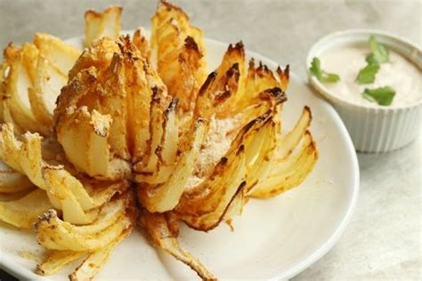 Cut off 1/2 inch from the pointy stem texas roadhouse: How To Make a Blooming Onion in an Air Fryer