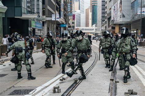 hong kong protest photos and videos show clash between protesters and police after a bystander dies