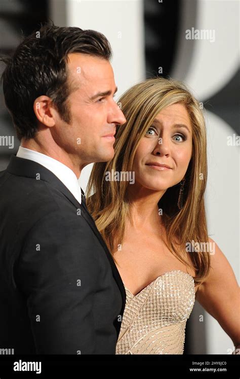 Justin Therouix And Jennifer Aniston Attending The 2015 Vanity Fair