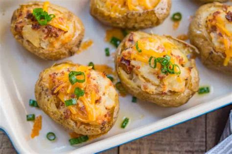 It may be served with fillings, toppings or condiments such as butter, cheese, sour cream, gravy, baked beans, and even ground meat or corned beef. Twice Baked Potatoes made with russet potatoes, cheddar ...
