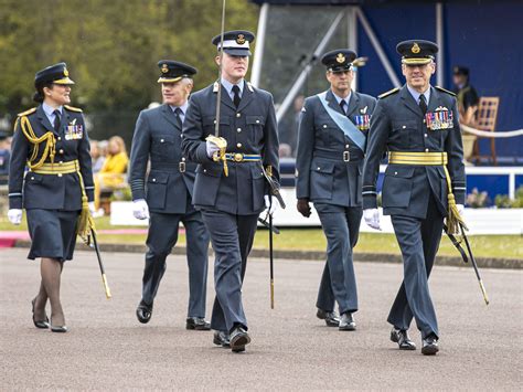 The Formal Uniform Of The Royal Air Force Worn At A Graduation Ceremony For New Officers At